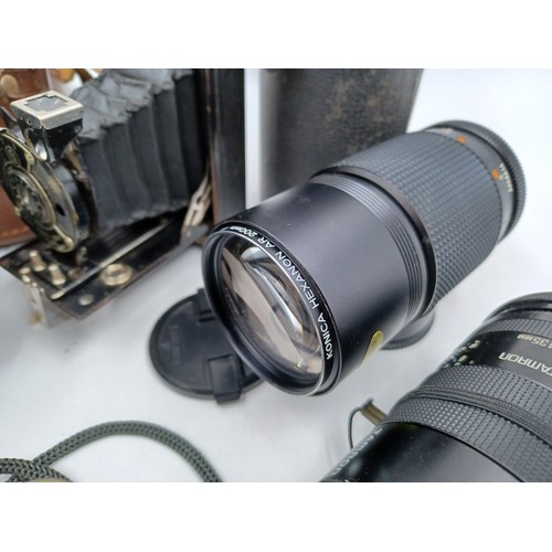 237 - A collection of camera and optical equipment to include cased Konica Hexanon AR 200mm F4 lens, Konic... 