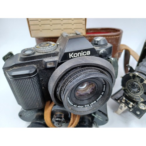 237 - A collection of camera and optical equipment to include cased Konica Hexanon AR 200mm F4 lens, Konic... 