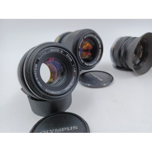 241 - Five Olympus OM system lenses, one S Zuiko 100-200mm 1:5 auto-zoom, one E.Zuiko f=135mm 1:3.5 Auto-T... 