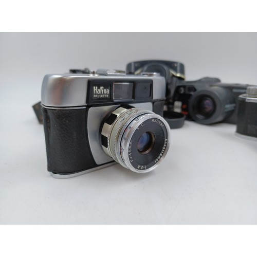 242 - Four 35mm cameras, one Haking Halina 35X viewfinder, one cased Haking Halina Paulette viewfinder, on... 