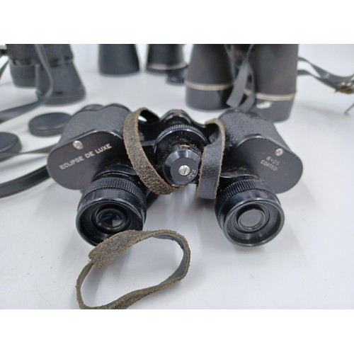 243 - Five cased pairs of binoculars, one Eclipse De Luxe 8 x 25, one Regent 12 x 50, one Panago 8 x 40, o... 