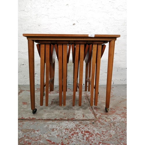 103 - A 1960s Czechoslovakian teak nest of five tables - largest approx. 56cm high x 62cm wide x 42cm deep