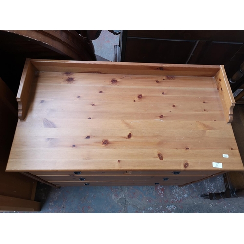 104 - A modern pine chest of two short over two long drawers - approx. 80cm high x 95cm wide x 49cm deep