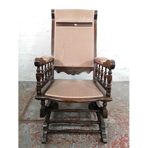 112 - An American style beech and brown upholstered rocking chair - approx. 102cm high x 54cm wide x 55cm ... 