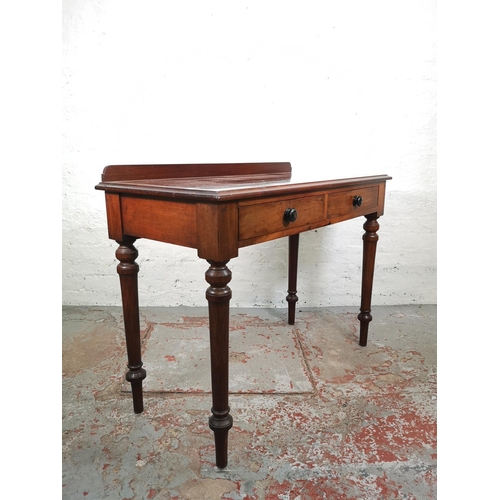 114 - A 19th century mahogany two drawer side table - approx. 83cm high x 107cm wide x 50cm deep