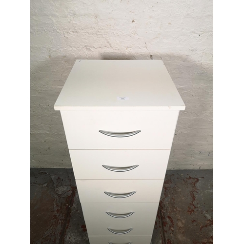 117 - A modern white laminate chest of six drawers - approx. 119cm high x 40cm wide x 41cm deep