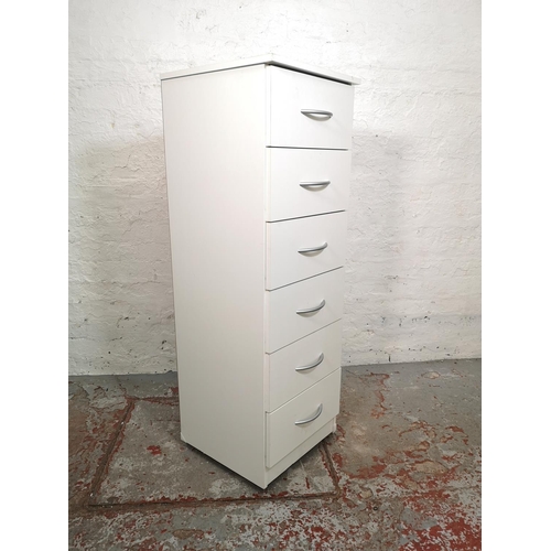 117 - A modern white laminate chest of six drawers - approx. 119cm high x 40cm wide x 41cm deep