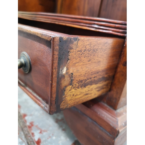 123 - An Edwardian style mahogany four tier waterfall bookcase with lower drawer - approx. 99cm high x 60c... 