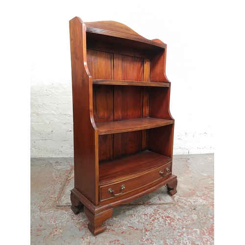 123 - An Edwardian style mahogany four tier waterfall bookcase with lower drawer - approx. 99cm high x 60c... 