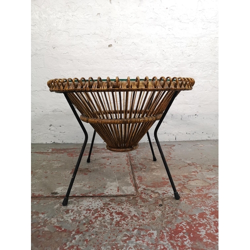 13 - A mid 20th century wicker and black metal circular coffee table with glass top - approx. 51cm high x... 