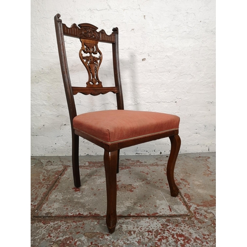 132 - A set of four Edwardian mahogany dining chairs