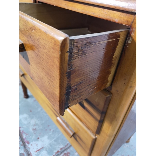 139 - A 1930s walnut chest of two short over two long drawers - approx. 77cm high x 79cm wide x 42cm deep