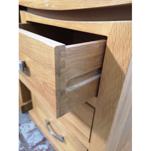 161 - A pair of modern solid oak bedside chests of three drawers  - approx. 60cm high x 50cm wide x 38cm d... 