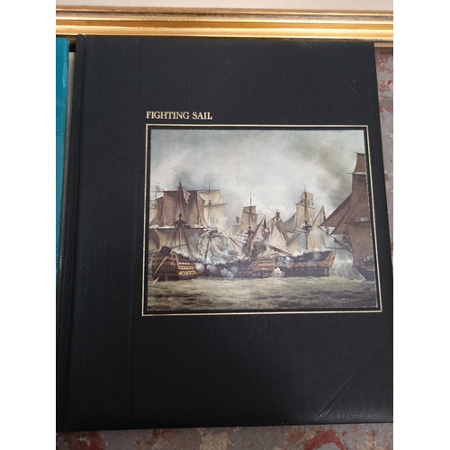 207 - A collection of maritime books and framed prints to include two John Chancellor pencil signed prints... 