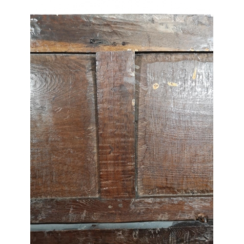 24 - A late 17th century oak three panel coffer - approx. 75cm high x 113cm wide x 50cm deep