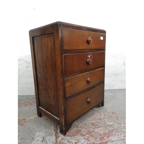 31 - A mid 20th century oak chest of four drawers - approx. 72cm high x 53cm wide x 45cm deep