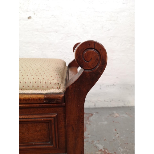 36 - An Edwardian style mahogany twin handled piano stool with cream upholstery - approx. 60cm high x 60c... 