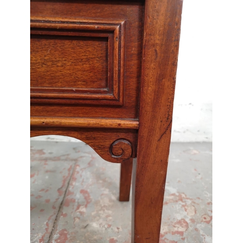 36 - An Edwardian style mahogany twin handled piano stool with cream upholstery - approx. 60cm high x 60c... 