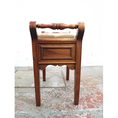 36 - An Edwardian style mahogany twin handled piano stool with cream upholstery - approx. 60cm high x 60c... 