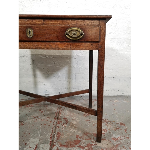 5 - A George III oak rectangular side table with lower X frame stretcher and single drawer - approx. 70c... 