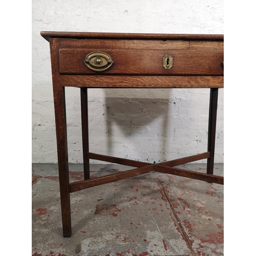 5 - A George III oak rectangular side table with lower X frame stretcher and single drawer - approx. 70c... 