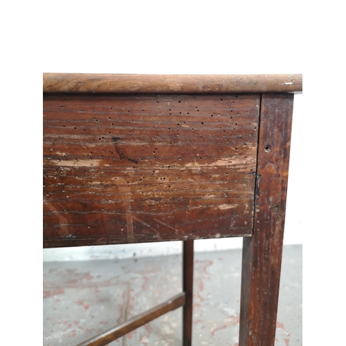 5 - A George III oak rectangular side table with lower X frame stretcher and single drawer - approx. 70c... 