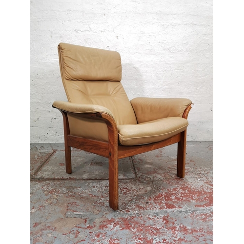 50 - A 1970s Göte Möbel tan leather and teak reclining armchair - approx. 95cm high x 79cm wide x 66cm de... 