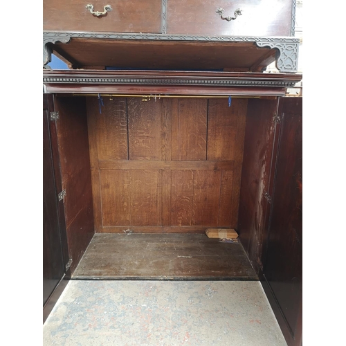 51 - An antique mahogany linen press converted wardrobe