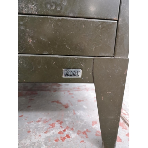 76 - A Stor military green metal ten drawer office filing cabinet - approx. 73cm high x 41cm wide x 47cm ... 