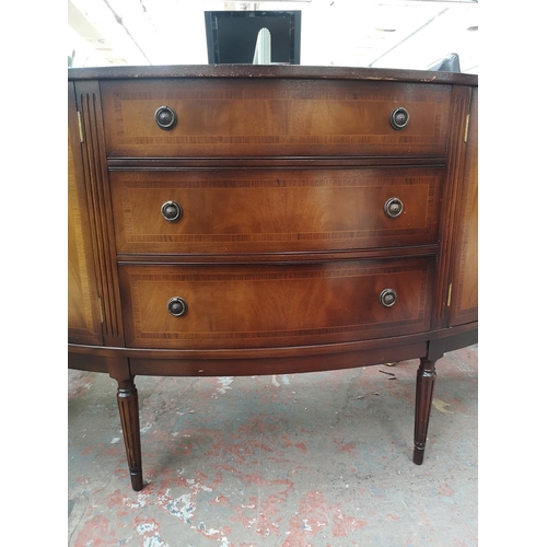 81 - A Strongbow Furniture mahogany bow fronted sideboard with three central drawers and two outer cupboa... 