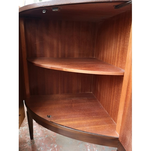 81 - A Strongbow Furniture mahogany bow fronted sideboard with three central drawers and two outer cupboa... 