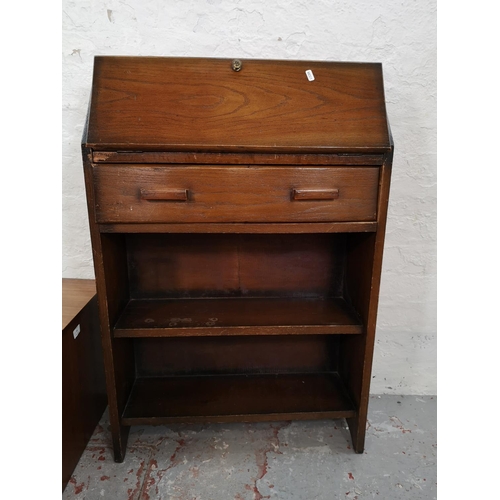 83 - Four pieces of furniture comprising mahogany nest of three tables, Avalon teak blanket box, oak bure... 