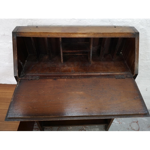 83 - Four pieces of furniture comprising mahogany nest of three tables, Avalon teak blanket box, oak bure... 