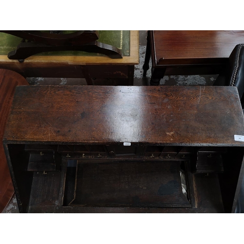 94 - A George III oak bureau - approx. 102cm high x 87cm wide x 50cm deep