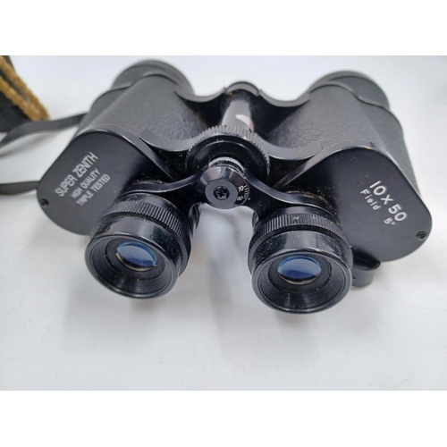 244 - Eight optical instruments to include boxed Seal radio binoculars, Bushnell Expo thumb focus binocula... 