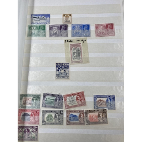 1618 - Five various stamp albums containing assorted stamps to include Commonwealth, British World Cup 1966... 