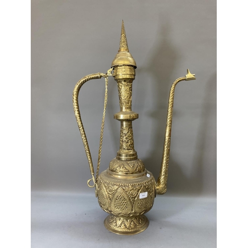 1624 - A large Middle Eastern brass ewer - approx. 90cm high