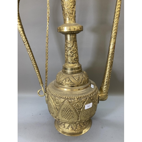 1624 - A large Middle Eastern brass ewer - approx. 90cm high