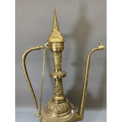 1624 - A large Middle Eastern brass ewer - approx. 90cm high