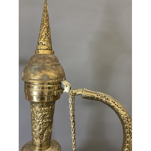 1624 - A large Middle Eastern brass ewer - approx. 90cm high