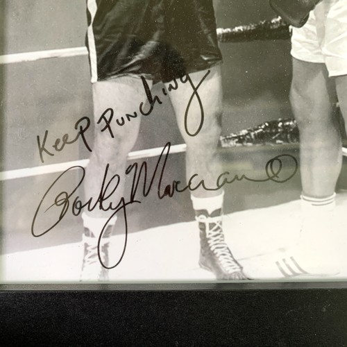 168 - A framed black and white photograph of Muhammad Ali and Rocky Marciano with printed autographs - app... 