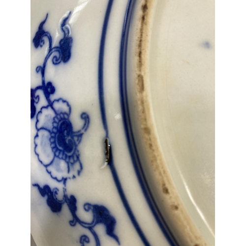 23 - A Chinese blue and white porcelain charger with character marks to reverse - approx. 30cm in diamete... 