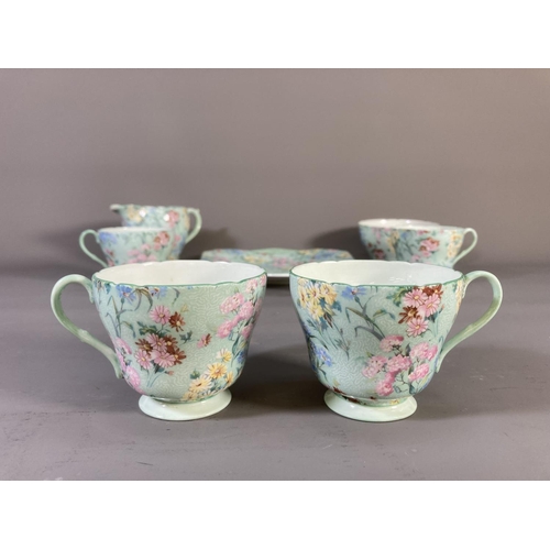 48 - Sixteen pieces of Shelley Melody china comprising four tea cups, five saucers, four side plates, cak... 