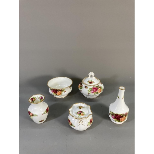 49 - Nineteen pieces of Royal Albert Old Country Roses china comprising two candlesticks, teapot, miniatu... 