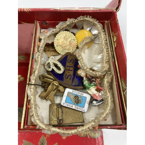 125 - Two boxes containing vintage and modern costume jewellery to include enamel badges, necklaces, earri... 