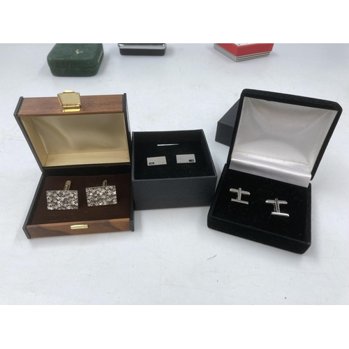 128 - A collection of boxed cufflinks to include mid 20th century 835 silver etc.