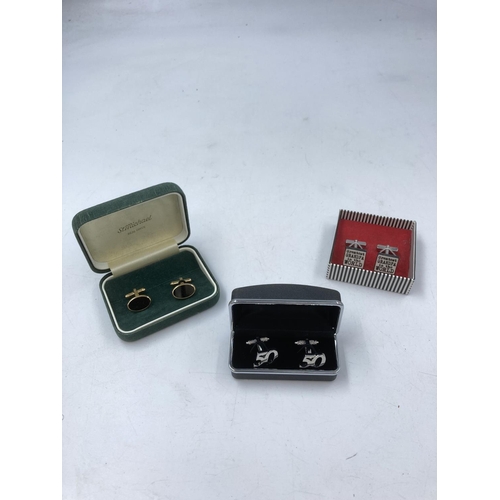 128 - A collection of boxed cufflinks to include mid 20th century 835 silver etc.