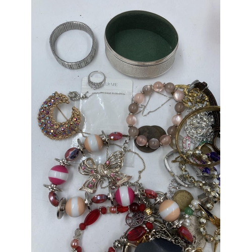 161 - A collection of assorted costume jewellery and wristwatches to include Laura Bella, boxed Swarovski ... 