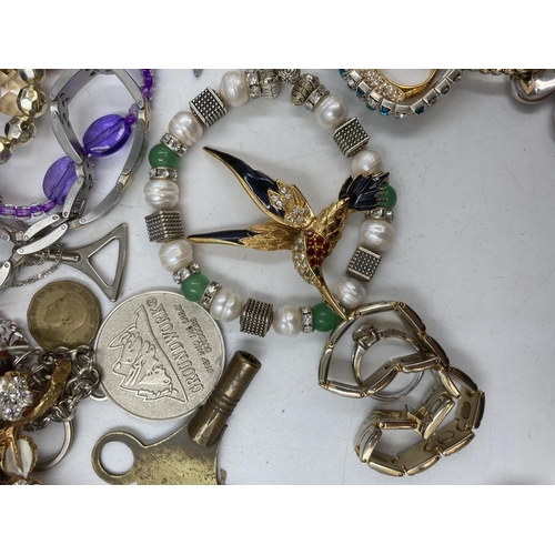 161 - A collection of assorted costume jewellery and wristwatches to include Laura Bella, boxed Swarovski ... 