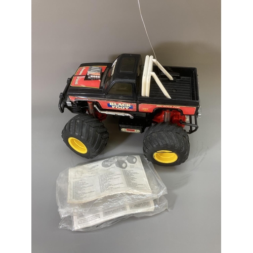 80 - A Tamiya 1/14 scale Blackfoot remote control plastic model monster truck with remote